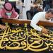 الخط العربي ينسج الجمال على ثوب الكعبة و«الثلث الجلي» يتوج كسوتها بهيبة الفن الإسلامي