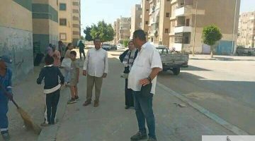 «جهود متواصلة» حي الأربعين بالسويس يكثف حملات النظافة في المدن السكنية