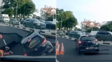 «كارثة في الطريق».. حفرة عملاقة تلتهم سيارة في شوارع سنغافورة!