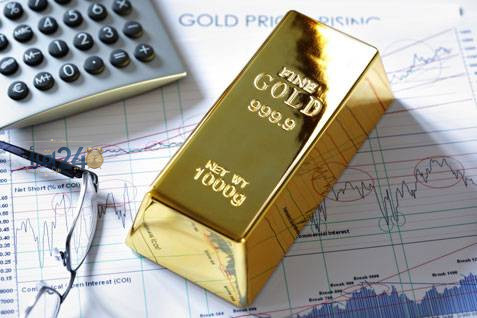 الذهب يتراجع بشكل هامشي مع توازن قوة الدولار وارتفاع عوائد السندات وسط تراجع توقعات زيادة الفائدة الأمريكية